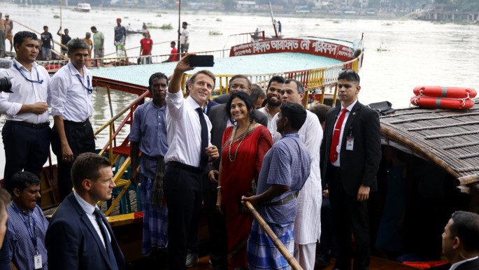 President Macron takes boat trip on Turag River